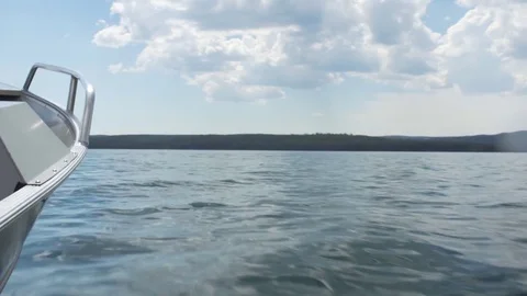 Starboard side of boat driving through water Stock Footage 79470367