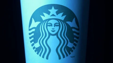 Starbucks coffee cup rotating in styled ice blue light medium CU shot 4k 動画素材 108190242