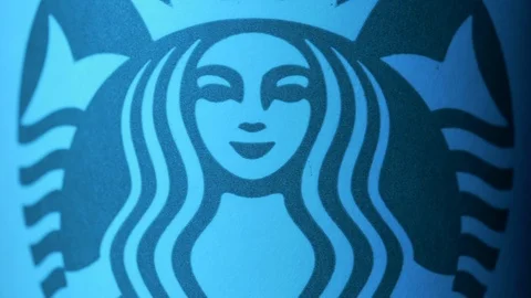 Starbucks coffee cup rotating in styled ice blue light ECU shot 4k Stock Footage 108190404