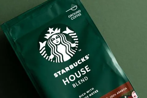 Starbucks coffee packaging. Green pattern background. House blend coffee bean Stock Photos