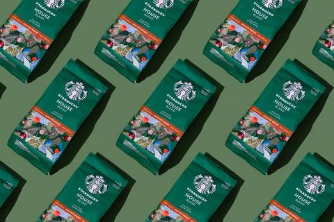 Starbucks coffee packaging. Green pattern background. House blend coffee bean Stock Photos