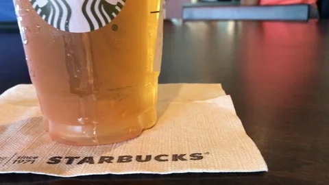 Starbucks Pineapple Tea Infusion Stock Footage 80241284
