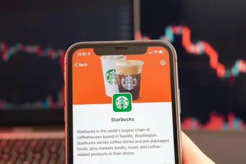 Starbucks stock price decrease on the trading market with downtrend line graph 스톡 사진