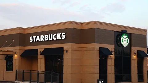 Starbucks storefront. Stockbeeldmateriaal 77997850