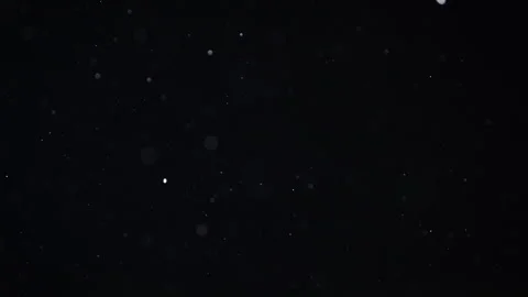 Stardust Particles Floating Spinning on Black Background, Cosmic Space Overlay Stock Footage 336622828