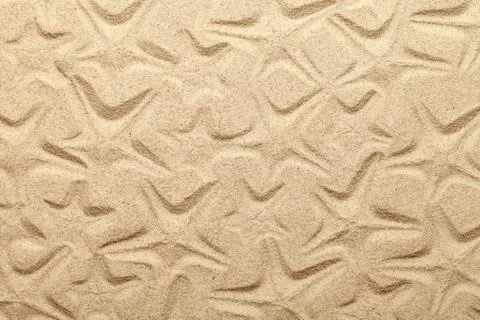 Starfish Patterns On Sandy Beach Stock Photos