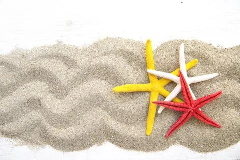 Starfishes on sand Stock Photos