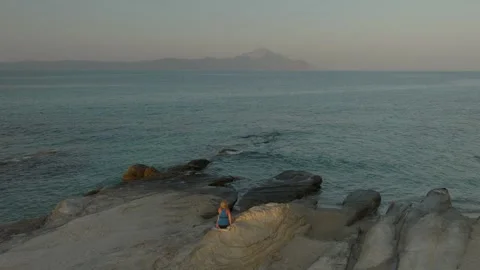 Staring At Mount Athos - Meditation on Beach Stock Footage 249654828