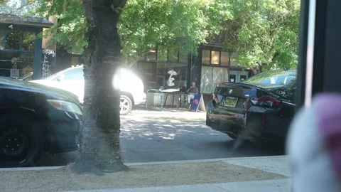 Staring outside a window on a summer day Portland OR USA September 2nd 2025 Stock-Footage 316200019