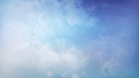 Starlings in Pattern Flight Blue Cloudy Sky 4K Loop Stock Footage 310520225
