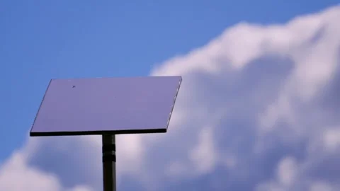 Starlink Satellite Internet Dish Receiver on Roof of Rural Home with Blue Sky Vídeo Stock 334020019