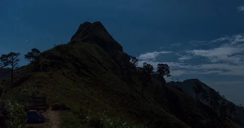 Starlit Night Sky over Khao Chang Puak Mountain Ridge (4K Time-lapse) Video stock 107905054