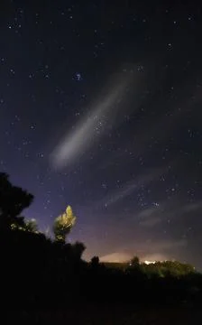 Starry night with clouds. Stock Photos