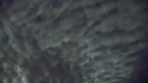 Starry night sky with approaching clouds. Shooting stars. Stock Footage 233722747