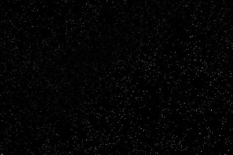 Starry night sky full of tiny stars across a vast, quiet celestial expanse Stock-Fotos