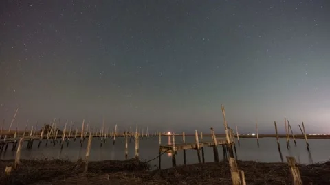 Starry night sky time lapse at Great Bay New Jersey in 4k Stock Footage 194401490