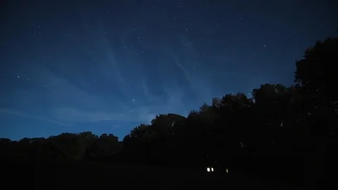 A Starry North Sky Time Lapse over a Cabin in a Forest in Kentucky Stock Footage 119705347