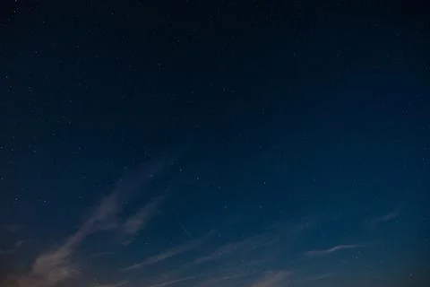 Starry sky with clouds summer night Stock Photos