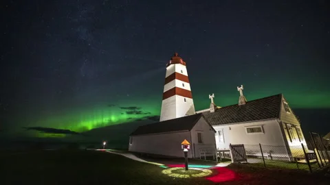 Starry sky with lighthouse an Milky Way Stock Footage 250799481
