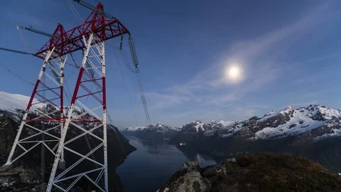 Starry sky over the high voltage power lines with moon Stock Footage 122945069