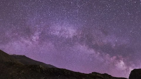 Starry sky over the hill  timelapse . Beautiful night sky with Milky Way galaxy. Stock Footage 318555170