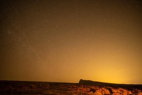 Starry sky over rocks Stock Photos