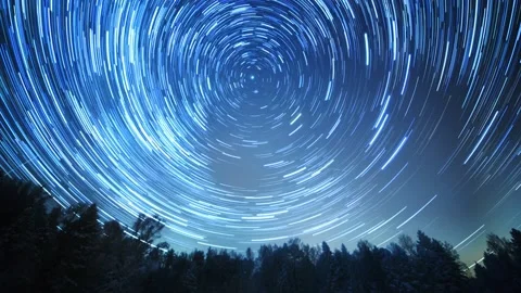 Starry sky revolves around the polar star. Leave traces in the form of lines. Stock Footage 166055995