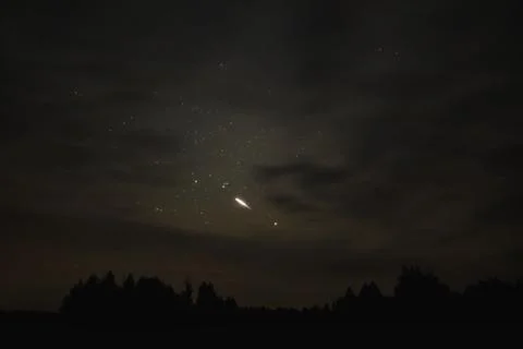 Starry sky through the clouds Stock Photos