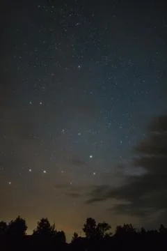 Starry sky through the clouds Stock Photos