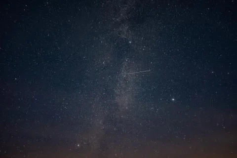Starry sky through the clouds Stock Photos