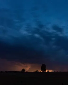 Starry sky through the clouds Stock Photos
