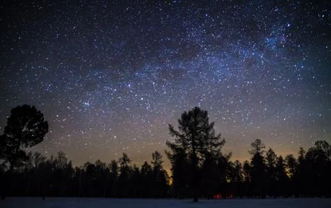 Starry sky in winter Stock Photos