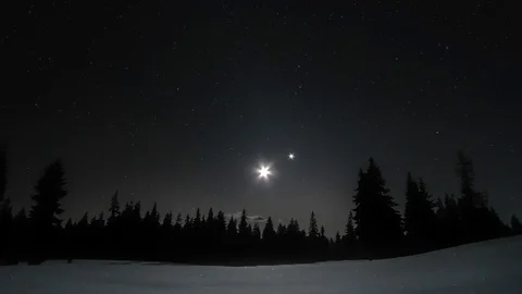 Stars and moon in starry sky Stock Footage 129686271