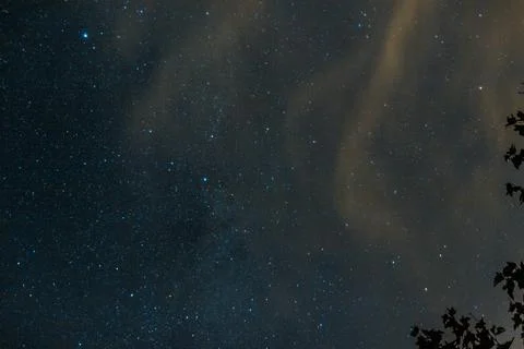 Stars in the Night with Orange Clouds Stock Photos