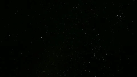 Stars sparkle in the darkness of the night sky. Stock Footage