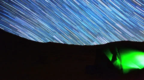 Stars Timelapse over Tent Switches to Amazing Star Trails Stock Footage