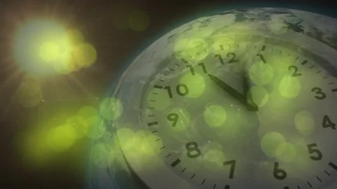 On start analog clock hands rotating clockwise, Earth shifting, green bokeh Stock-Footage 331125585