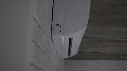 Start and end work of air conditioner. Turning On wall mounted air conditioner Video stock 120939496