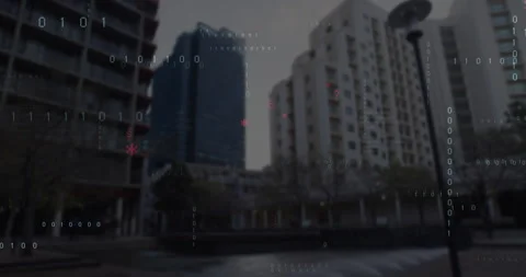 At start, binary digits and red glyphs floating and accumulating over urban Stock Footage 310324449