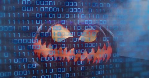 At start binary overlay appearing, pumpkin glowing, smoke rising, code Stock Footage 317772730