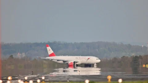 Start of an boeing 777 operaterd by austrian airlines after Stock Footage 128354593