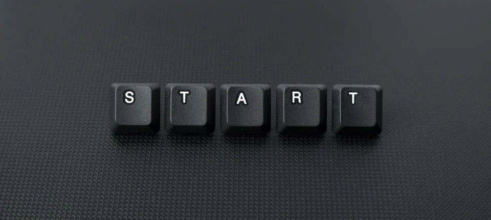 Start Button Concept With Keyboard Keycaps On Dark Background Stock Photos