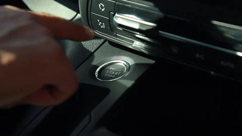 Start button. Engine starting. The finger presses the auto start button Stock Footage 141432917