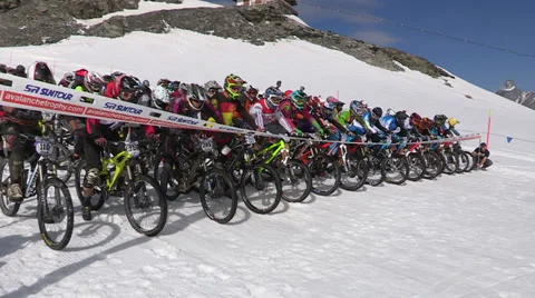 Start of bycicle race on snow Stock Footage 33061367
