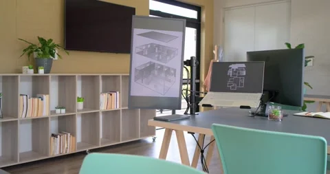 On start, camera pushing forward and panning right showcasing laptop blueprint Stock Footage 340972644