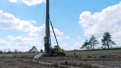 Start of construction, driving the first pile . Stock Footage 241578749