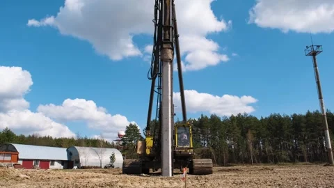 Start of construction, driving the first pile . Stock Footage 241578777