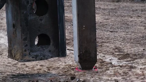 Start of construction, driving the first pile . Stock Footage 241578782