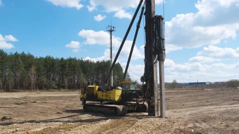 Start of construction, driving the first pile . Stock Footage 241578801