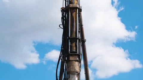 Start of construction, driving the first pile . Stock Footage 241578802